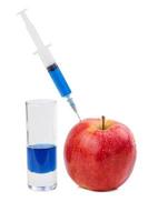 Injektion von rotem Apfel foto