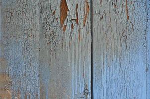 Holzblaue Oberfläche mit Rissen und Schrammen foto