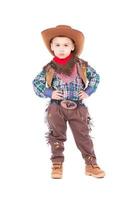 kleiner Junge im Cowboy-Anzug foto