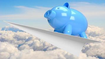 das blaue sparschwein auf papierflugzeug im himmel für verdienen oder sparen konzept 3d-rendering foto