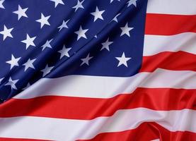 nationale textilflagge der vereinigten staaten von amerika, oberfläche in wellen. foto