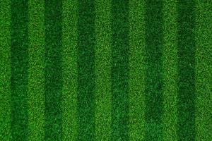Abstraktes grünes Gras-Fußballfeld aus Kunstrasen-Hintergrundtextur, Ansicht von oben foto