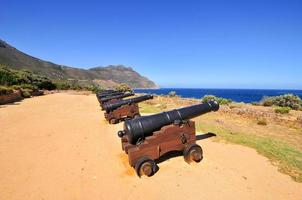 Kanonen entlang Chapmans Peak, Kapstadt, Südafrika foto