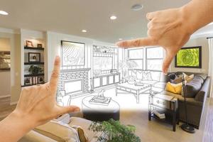 Hände, die benutzerdefinierte Wohnzimmerzeichnungsfotokombination einrahmen foto