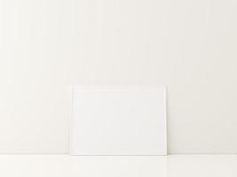 rahmen mit plakatmodell, das auf dem weißen boden steht. minimalistisches rahmenmodell. 3D-Rendering foto