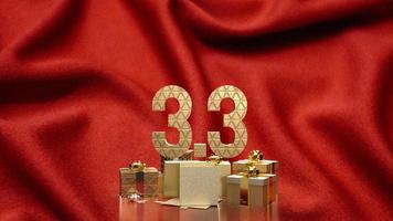 die 3.3 und die goldene geschenkbox auf roter seide für marketing oder verkaufsförderung 3d-rendering foto