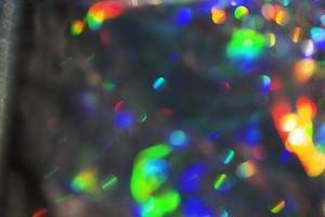 Regenbogen holographischer Bokeh-Hintergrund. mehrfarbige Farbüberläufe. foto