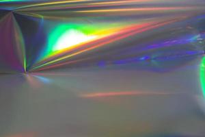 Regenbogen-Hintergrund. holographischer abstrakter weicher pastellfarbener hintergrund. holografische Hintergrundfolie. mode kreativer verlauf foto