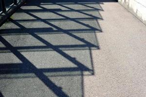 Glas Zaun Schatten zum Hintergrund. foto