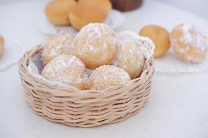 köstlich Schneeball Donuts wie ein Hintergrund foto