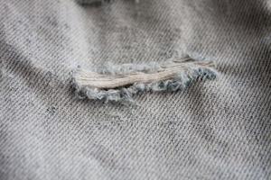 Jeans zerrissene Denim-Textur foto