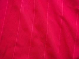 roter Sportbekleidungsstoff Jersey-Textur foto