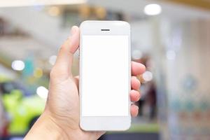 weißes Smartphone mit leerem Bildschirm foto