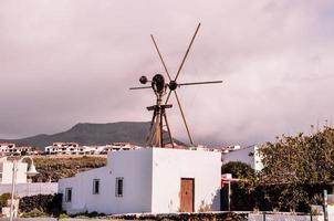 klein Windmühle auf das Dach foto