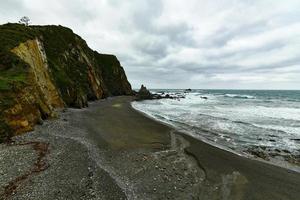 das campiecho Strand ist gelegen im Asturien, Spanien auf ein wolkig Tag. foto