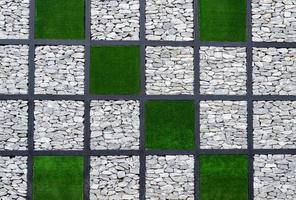 Grün Gras Backstein Mauer mit Schach Muster Hintergrund foto