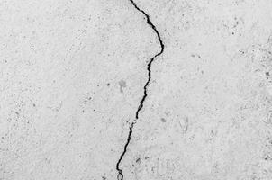 grungy Mauer mit groß Riss Zement Fußboden Textur, Zement groß Riss zum Hintergrund foto