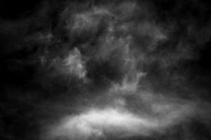 Strukturierter Hintergrund der weißen Wolke und des schwarzen Himmels foto