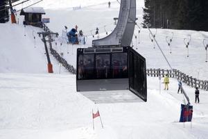 Seilbahn in den Dolomiten Grödner Tal Schneeberge foto