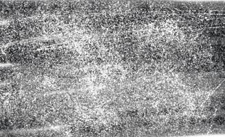 Grunge-Schwarz-Weiß-Muster. monochrome Partikel abstrakte Textur. Hintergrund von Rissen, Schrammen, Spänen, Flecken, Tintenflecken, Linien. dunkle designhintergrundoberfläche. foto