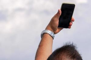 hand, die selfie-foto mit smartphone macht foto