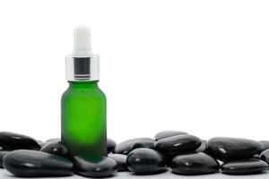 Serum-Öl-Tropfflasche für ätherische Öle mit schwarzem Stein foto