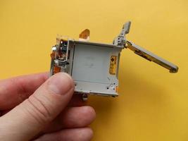 Reparatur und Demontage von ein Tasche Digital Kamera foto