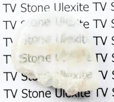 poliert Ulexit Fernseher Felsen natürlich Mineral Stein foto