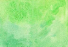 Aquarell hellgrüne Hintergrundtextur. aquarell kelly grüner farbhintergrund. Flecken auf Papier foto