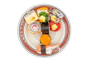 Gruppe von japanisch Sushi Essen isoliert auf Weiß Hintergrund. foto