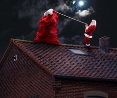 Santa claus bereit zu liefern die Geschenke zum Weihnachten foto