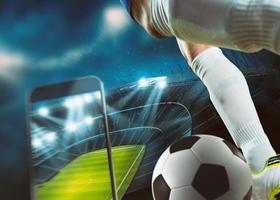 Leben Sport Veranstaltung auf ein Handy, Mobiltelefon Gerät, Wetten auf Fußball Spiel foto