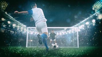 Fußball Szene beim Nacht Spiel mit Spieler im ein Weiß und Blau Uniform treten das Strafe trete foto