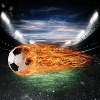 Fußball Ball von Feuer beim das Stadion foto