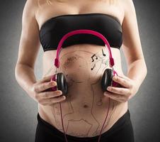 ungeboren Baby Hör mal zu zu Musik- foto