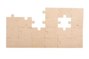 Puzzle Mauer mit fehlt Stück. Konzept Zusammenarbeit, Partnerschaft, Integration foto