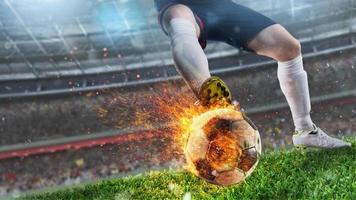 mächtig trete von ein Fußball Spieler mit feurig Ball foto