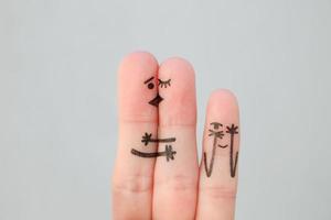 Finger Kunst von glücklich Familie. Konzept von Paar Küsse, Kind Spione auf ihnen. foto