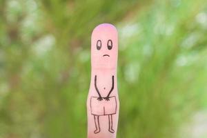 Finger Kunst von traurig Mann. Konzept von Impotenz. foto