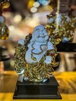 Weiß und Gold Statue von Glücklich baba foto