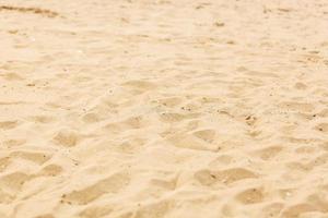 Nahaufnahme des Sandmusters eines Strandes im Sommer foto