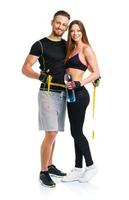 Mann und Frau mit Messung Band auf das Weiß Hintergrund foto