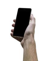 männlich Hand halten schwarz Handy mit schwarz Bildschirm beim isoliert Weiß Hintergrund. foto