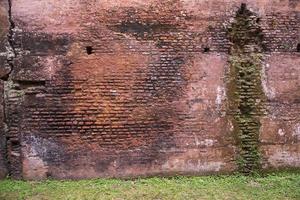 alt historisch Gebäude Backstein Mauer Grunge Muster Textur können Sein benutzt wie ein Hintergrund Hintergrund foto