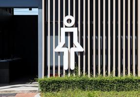 Licht Box Frau Symbol Toilette im Gas Bahnhof foto