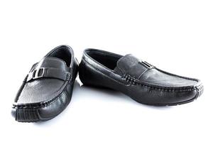Paar von schwarz männlich klassisch Schuhe auf Weiß Hintergrund foto