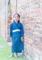 süß Mädchen tragen National Kostüme von Japan foto