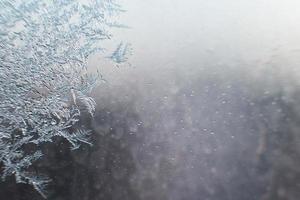 Schnee Muster auf das Glas von Frost foto