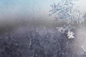 Schnee Muster auf das Glas von Frost foto