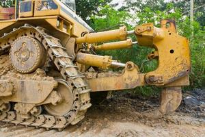 Bulldozer, der vor Ort arbeitet foto